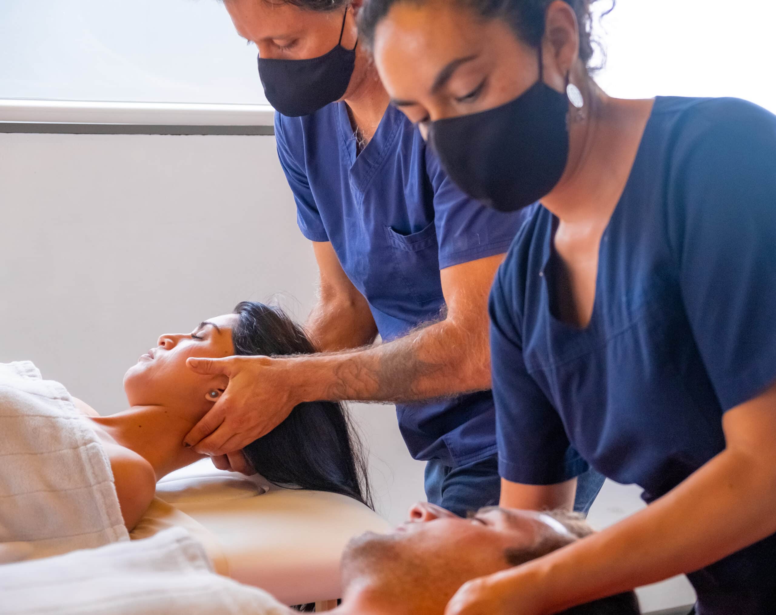 professional masseurs, doing treatments in a Massage Clinic